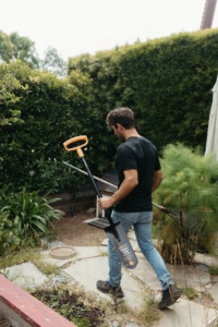 Farmer Nick holding a shovel