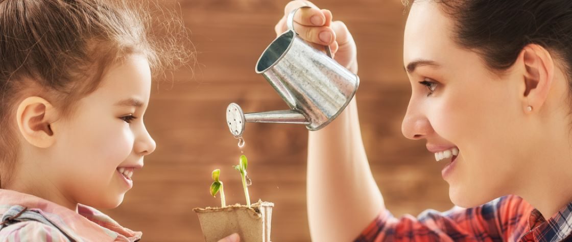 seed starting, young woman and child