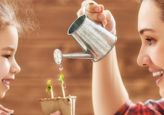 seed starting, young woman and child