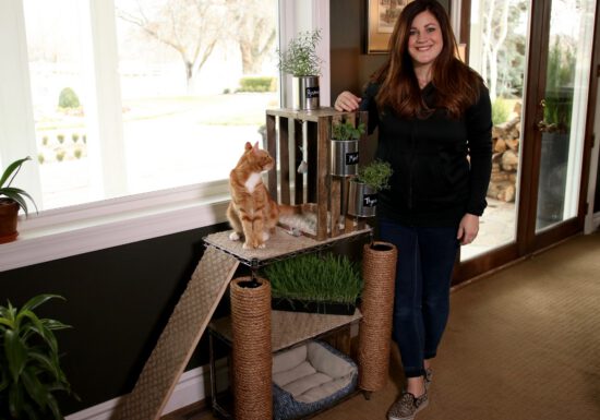 Laura from Garden Answer next to her cat tower planter