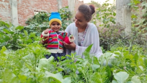 Woman and child in garden