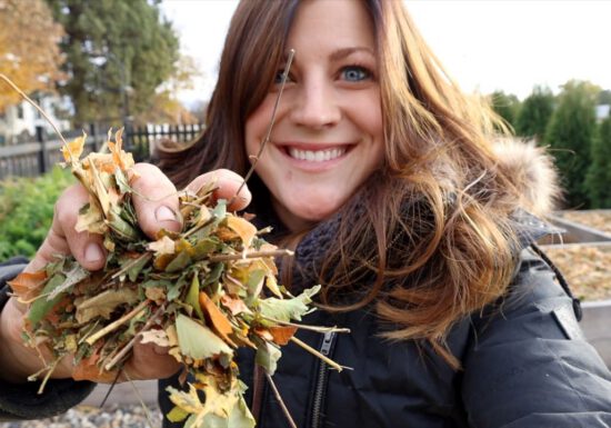 Laura from Garden Answer holding leaves