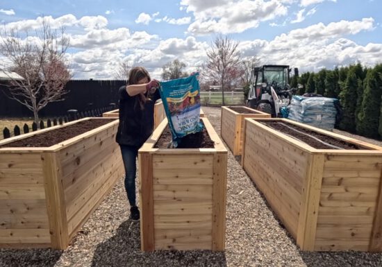 Garden Answer Planting raised beds with Espoma Organic Land & Sea Compost
