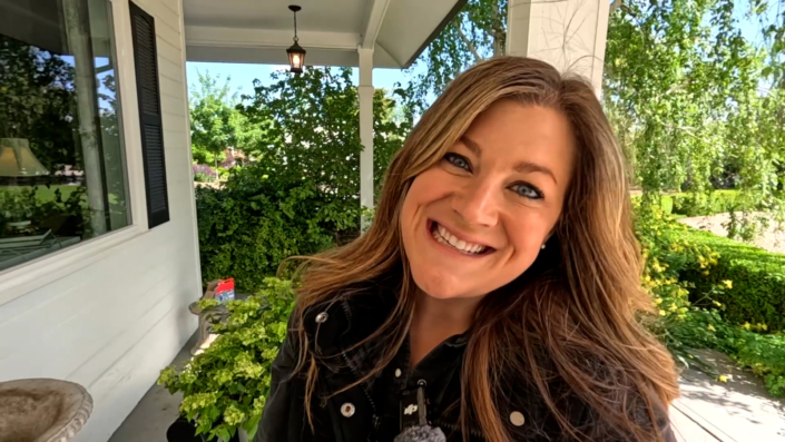 Laura from Garden Answer on her porch planting containers