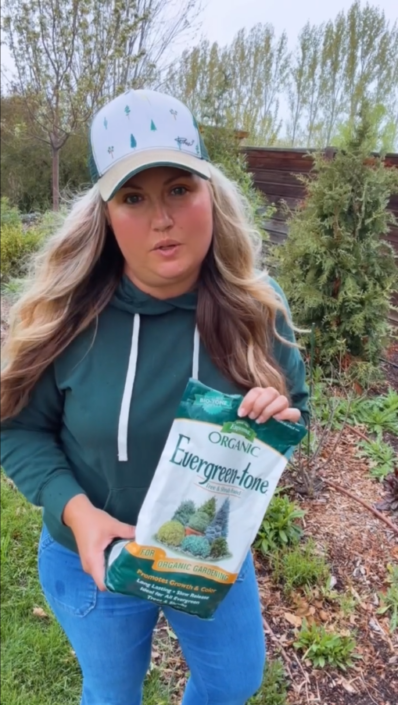 Skye Hamilton holding a bag of Evergreen-tone.